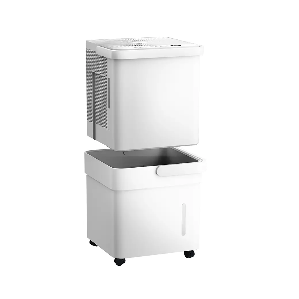 Midea MAD50PS1QWT-A upper unit lifted above its separate water bucket.
